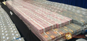 Polri Bongkar Jaringan 21 Situs Judol: Tumpukan Uang Rp 96,7 Miliar Disita!